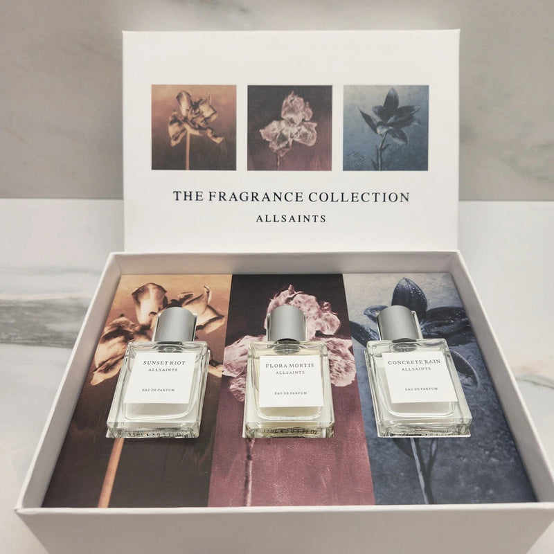 Fragrance travel set with three EDP bottles: Sunset Riot, Flora Mortis, Concrete Rain.