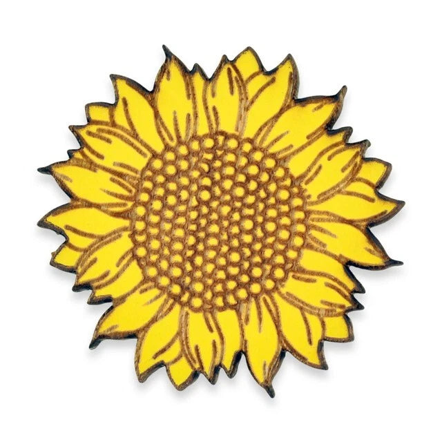 Yellow sunflower-shaped wood pin with textured center and black outline