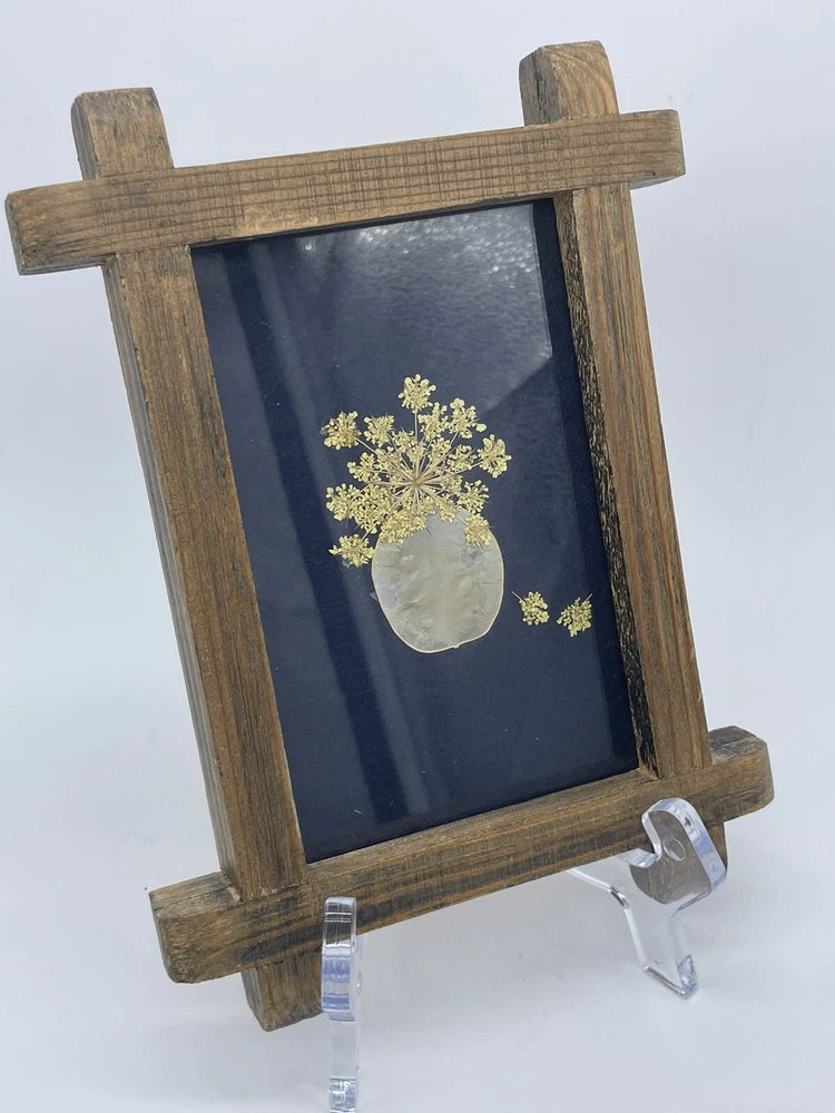 Vintage dried flower framed picture with rustic wooden frame and small yellow dried flowers