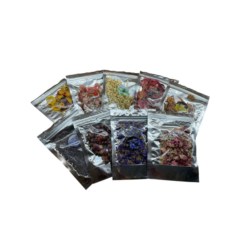 Assorted dried flower mix set, multiple small clear packets with dark and bright blooms