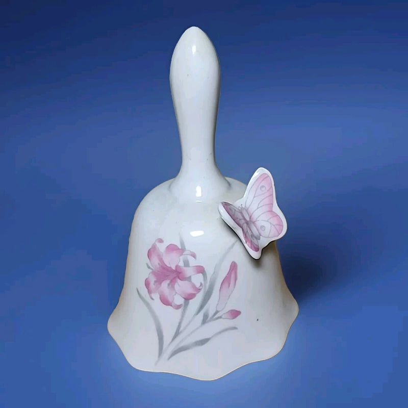 White ceramic bell with pink lily and butterfly detail