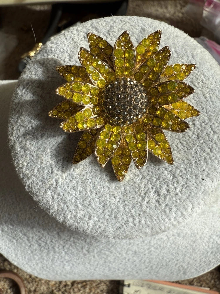 Sunflower-shaped rhinestone brooch with gold and yellow crystal petals