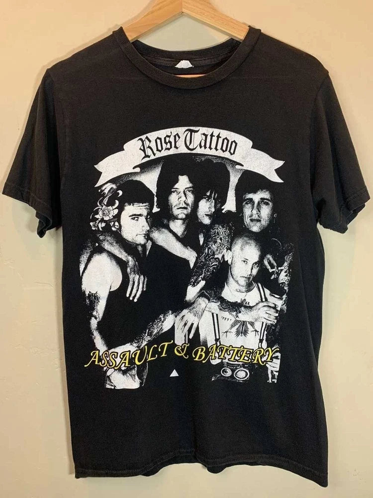 Unisex black graphic T-shirt with Rose Tattoo portrait and "Assault & Battery" text