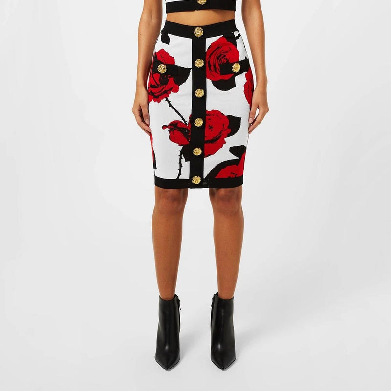 Floral jacquard knit skirt with red rose print, black panels, gold button front