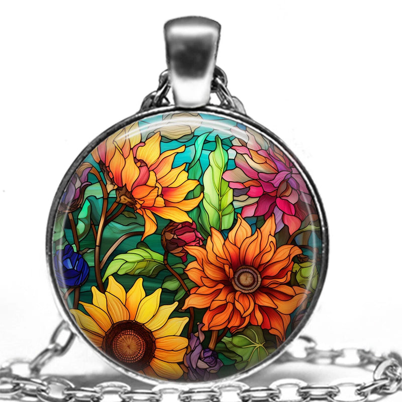 Flower pendant necklace with colorful garden blooms in round glass, silver chain