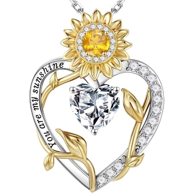 Sunflower heart pendant necklace with gold accents and clear cubic zirconia stones