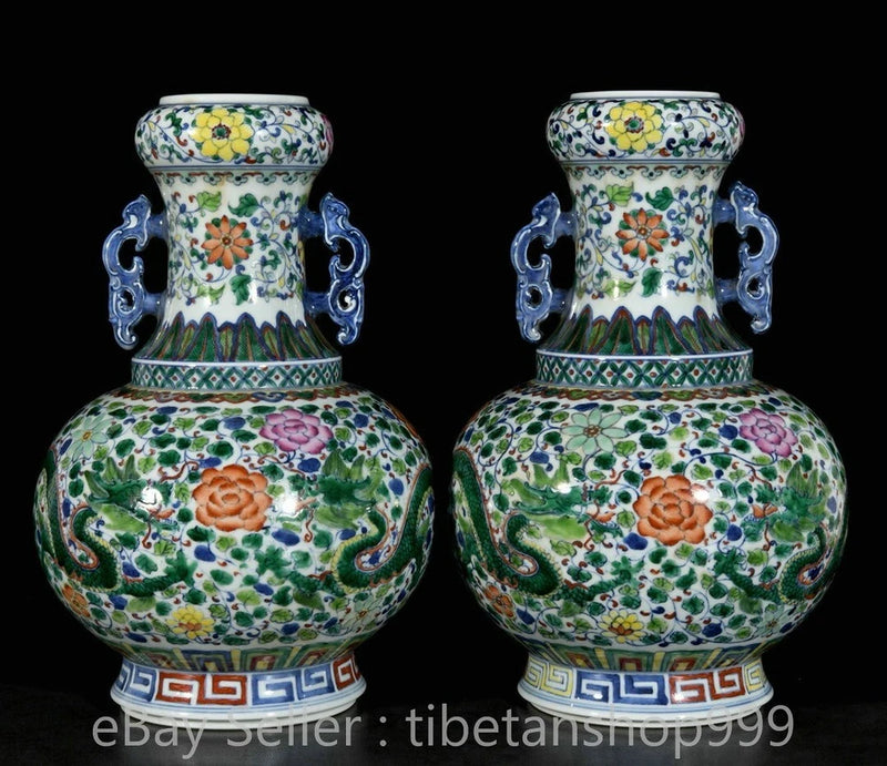 Doucai porcelain pair of peony flower dragon vases with blue rim and handles