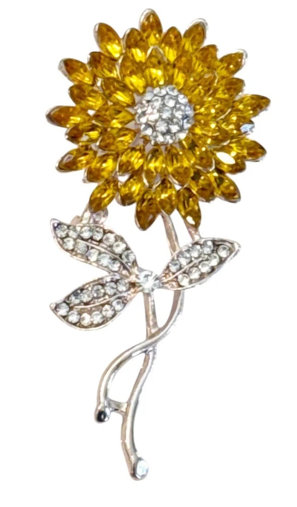 Sunflower gold-tone stone pin brooch with white pave center and gem leaves on stem