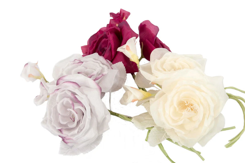 Large twin silk rose flowers set with cream, white, and pink blossoms for hat making