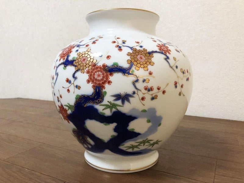 Arita-Yaki peony porcelain vase, white with blue and red floral landscape scene
