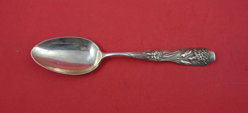 Sterling silver teaspoon with floral handle, 5 3/4 in