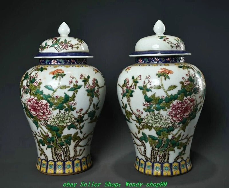 Pair of lidded porcelain vases with floral peony pattern, off-white ground, blue rim