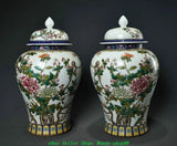 Pair of lidded porcelain vases with floral peony pattern, off-white ground, blue rim