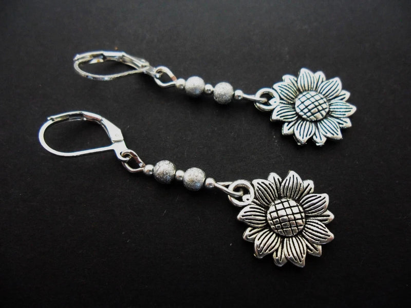 Tibetan silver sunflower leverback hook earrings with bead accents