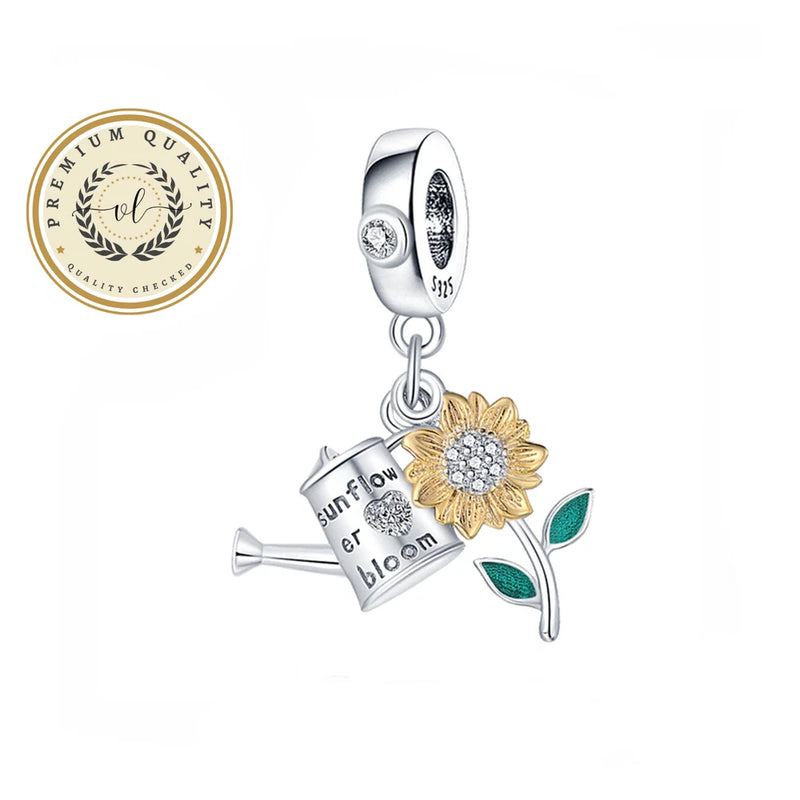 Sunflower dangle bracelet charm with gold flower, green leaves, and small clear stones