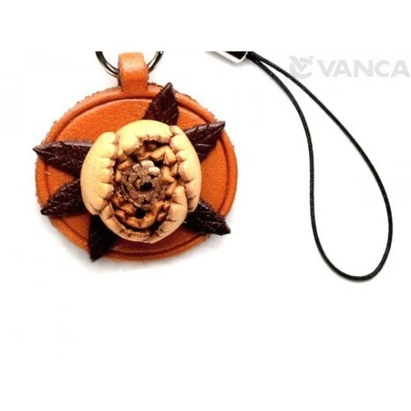 Leather phone charm: orange peony-style flower with beige center, dark accents, cord loop