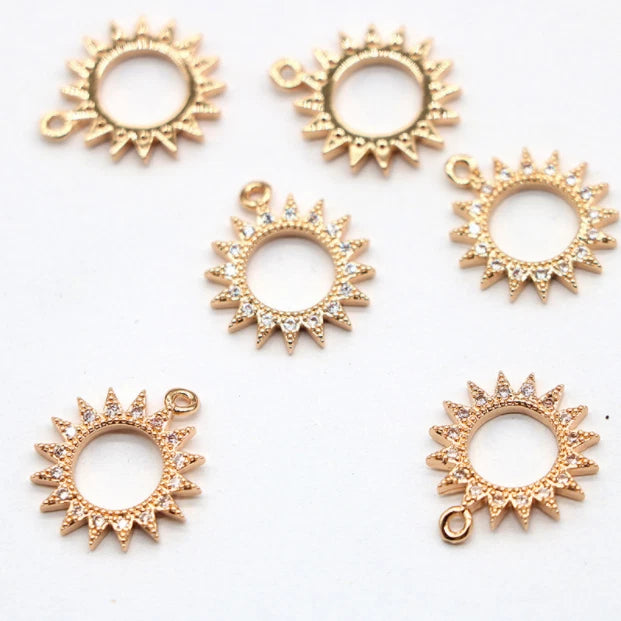 Gold-tone sunflower CZ pave charm set, 10 sunburst pendants with loop and clear stones