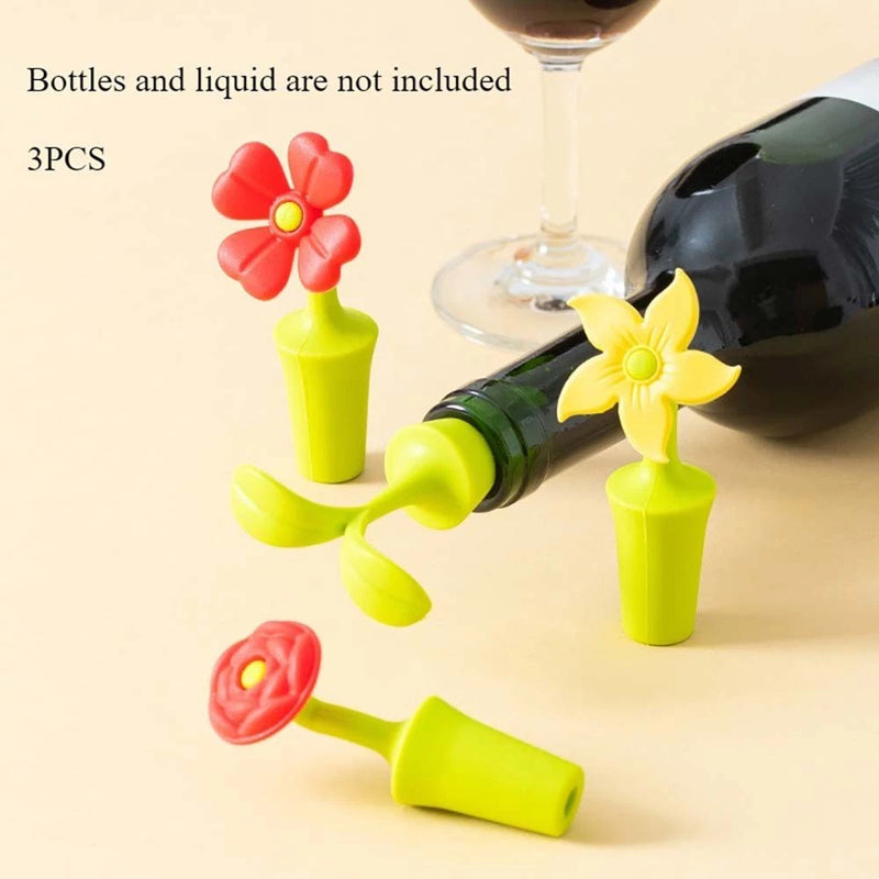 Flower-shaped silicone wine stoppers, yellow and red flower tops on green stems