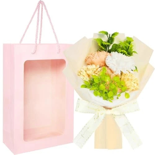 Champagne flower gift box with bouquet, cream wrap and pink window gift bag