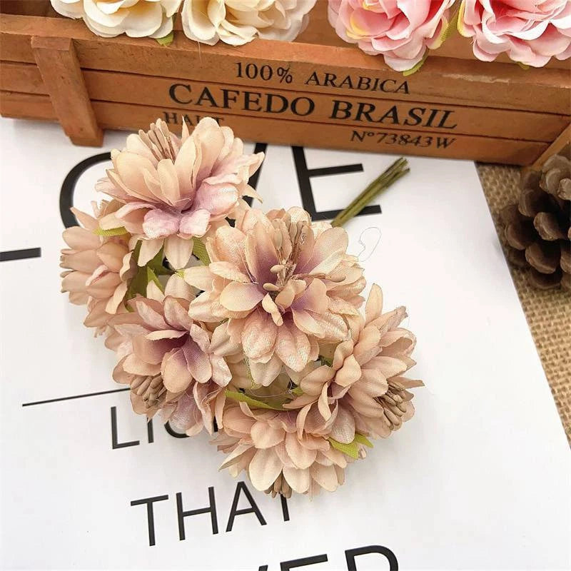 Small carnation flower headdress with pale pink and beige blooms, fabric petals