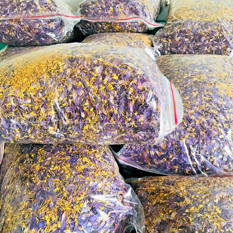 Bagged dried tea lily flower petals with yellow stamens and purple petals
