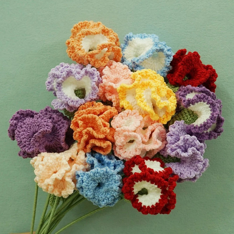 Multicolor knitted flower arrangement with green stems, crocheted petal blossoms