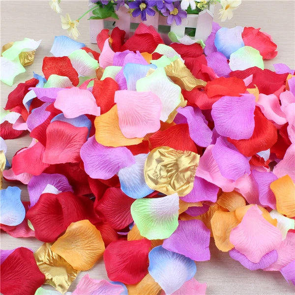 Colorful silk rose petal confetti with mixed pink, red, gold, and white petals