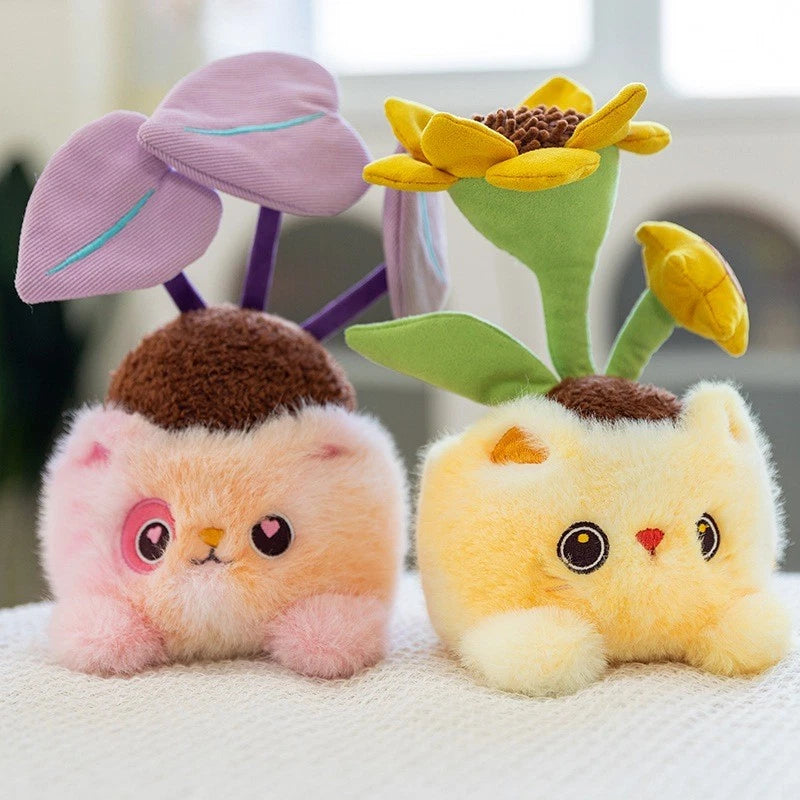 Plush toy cat with sunflower cactus head, pink and yellow seated